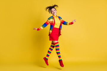 Fototapeta na wymiar Full length body size view of attractive carefree funky cheery wavy-haired girl jumping isolated bright yellow color background