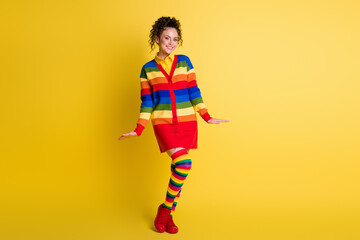 Full length photo of attractive teen girl wear rainbow red skirt shoes isolated shine color background