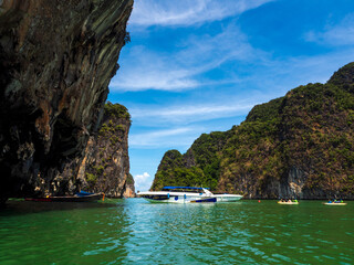 A beautiful turquoise river and huge islands along the way.