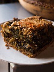 Preparation of delicious home made farm style rustic spinach pie.