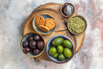 top view sweet biscuits with fruits on light background photo tea dessert