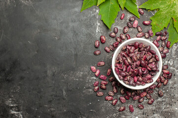 top view fresh beans with green leaves on a dark background bean raw color fresh