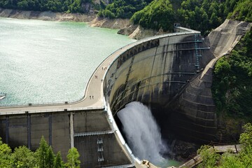Draining water from Kurobe Dam in Tateyama Kurobe Alpine Route, Toyama, Japan - 黒部ダム 放水 富山県 中新川郡 立山町 日本	