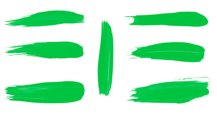 Set of green paint stroke brushes