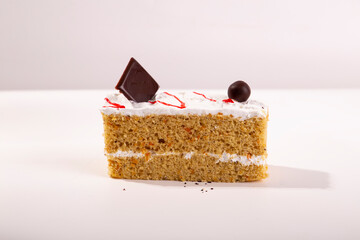 White chocolate cake slice  on white background
