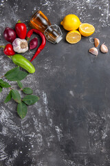 top view fresh ingredients oil garlic lemon slices and other products on a dark background photo food fruit many