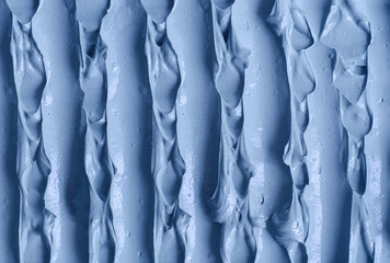 Light blue bentonite facial clay (alginate mask, face cream, body wrap) texture close up, selective...