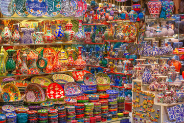 Fototapeta na wymiar Traditional decorated turkish souvenirs sold in Grand Bazaar in Istanbul, popular tourist attraction