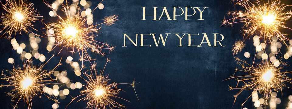 HAPPY NEW YEAR Fireworks sparkler 2024 background greeting card - Firework, sparklers and bokeh lights and sparklers on dark blue night sky