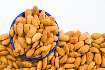 Almonds on the white background, walnut snack