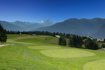 Fototapeta na wymiar mountain golf course in crans-montana