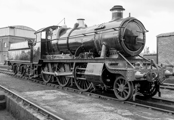 Fototapeta na wymiar Steam engine on a railway track