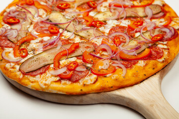 Tasty pizza Spicy pepper served on a wooden plate, ingredients Signature sauce, mozzarella cheese, pepperoni, pickled cucumber, Bulgarian pepper, red onion, chili pepper. Pizzeria promotion poster