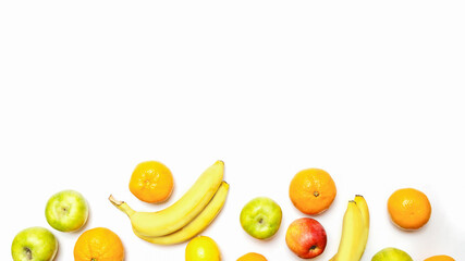 different fresh sweet fruits on a white background with copy space for text. Healthy eating