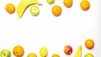 different fresh sweet fruits on a white background with copy space for text. Healthy eating