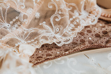 Lace fabric background,  beige embroidered piece fabric