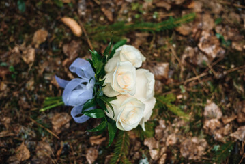 wedding flower bouquet lies on the foliage