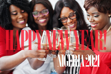 Happy New Year 2021 Nigeria! Group of partying african girls clinking glasses with sparkling wine champagne.