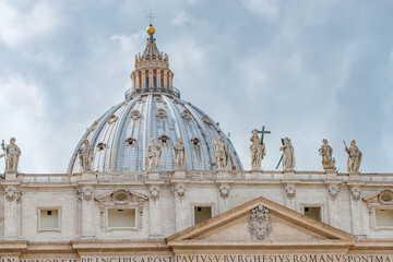 Dramatic view over Saint Peter Basilica in Vatican city, in the center of Rome, Italy, with heavy...
