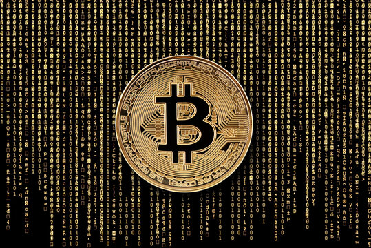 Bitcoin golden coin on golden computer data background