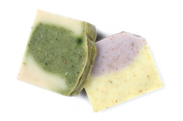 Organic handmade herbal plant soap bars isolated on white background, top view