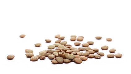 Green lentils pile isolated on white background