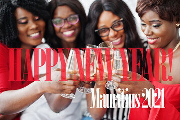 Happy New Year 2021 Mauritius! Group of partying african girls clinking glasses with sparkling wine champagne.