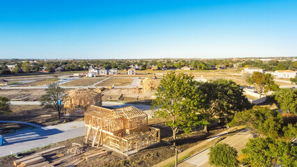 Top view suburban master planned community with under construction house near Dallas, Texas, USA