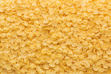 Many raw farfalle tonde in studio
