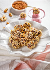 French chocolate truffles on a white cake stand