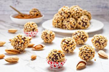 Close-up on truffles on a white marble background
