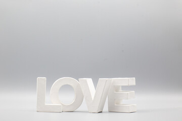 word love with white 3d letters and grey background plus copy space