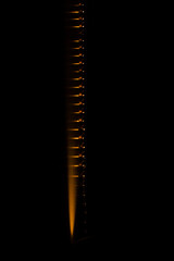 Minimalistic photography, orange beads lined up, geometry and perspective of round objects