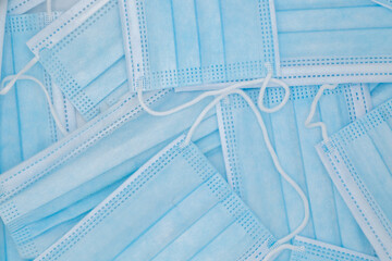 Horizontal background with surgery masks in covid 19 times