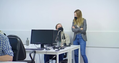 MS DS Office workers wearing protective face masks - Powered by Adobe