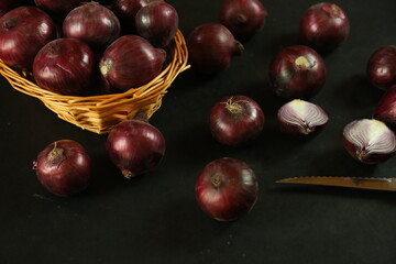 sweet red onions on background