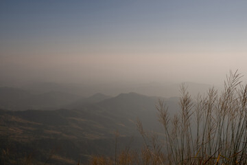 View of hill with mist and blue sky background, Phu Langka national Park, Phayao, Thailand.