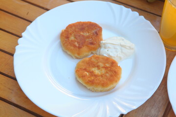 Cottage cheese with sour cream for breakfast