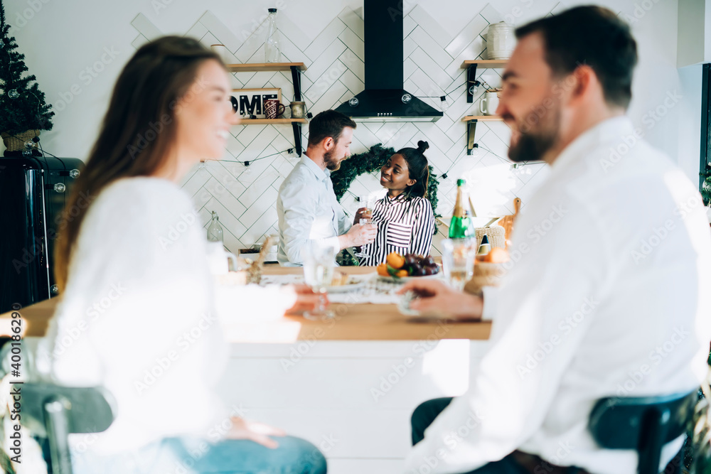 Wall mural couples connecting at christmas party