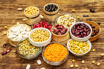 Set of various dry legumes in bowls as indispensable protein for a healthy life