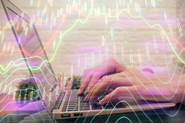 Multi exposure of woman hands typing on computer and forex chart hologram drawing. Stock market analysis concept.