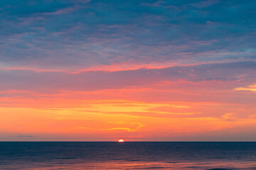 Fototapeta premium Beautiful red sunset on the sea landscape