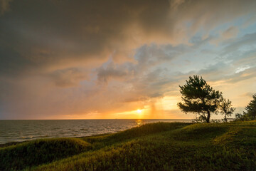 Fototapeta na wymiar Beautiful orange sunset on the sea landscape