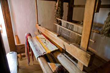  old large antique retro weaving machine in a country cottage in poland
