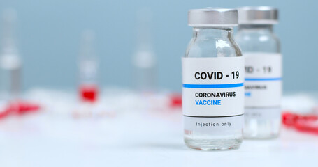 Coronavirus Sars-Cov-2 vaccine vials with copy space in the laboratory. Covid-19, 2019-nCov pandemic.