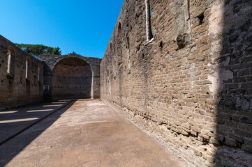 Rome, the Via Appia Antica and the church of San Nicola in Capo di Bove, detail of the interior, the nave and the apse with the blue sky on a sunny day. Rome Capo di Bove