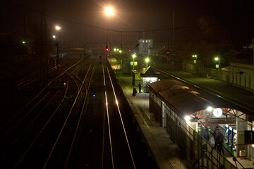 Fototapeta na wymiar The platform of railway station at night