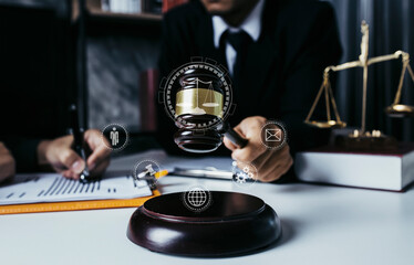 justice and law concept.Male judge in a courtroom on table office, Male lawyer working  law interface icons.