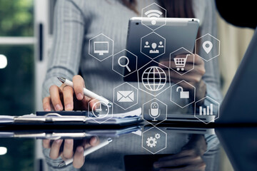 Businessman hands working on network and digital finance marketing chart with future technology innovation and digital transformation concept.
