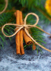 Festive background for the new year 2021. Christmas tree on the table with dried fruits and spices, background for New Year's recipes. Elegant card decor for Christmas greetings.